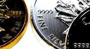 Precious Metals Bullion Investing, gold and silver Canadian Maple Leaf bullion coins, one ounce